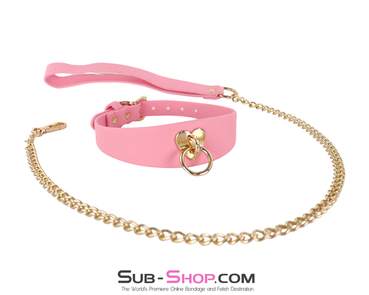 Front view of gold heart collar with shiny gold chain extending forward.