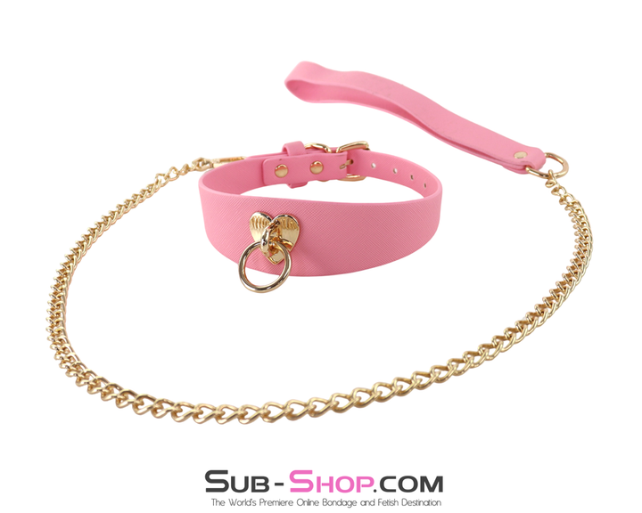 Angled display of pink collar and long gold chain leash laid out in a curve.
