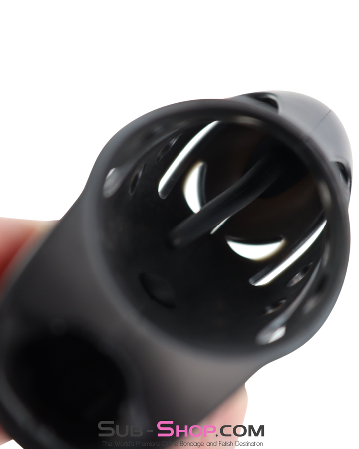 Interior view of the chastity cage showing the smooth internal channel and vent openings