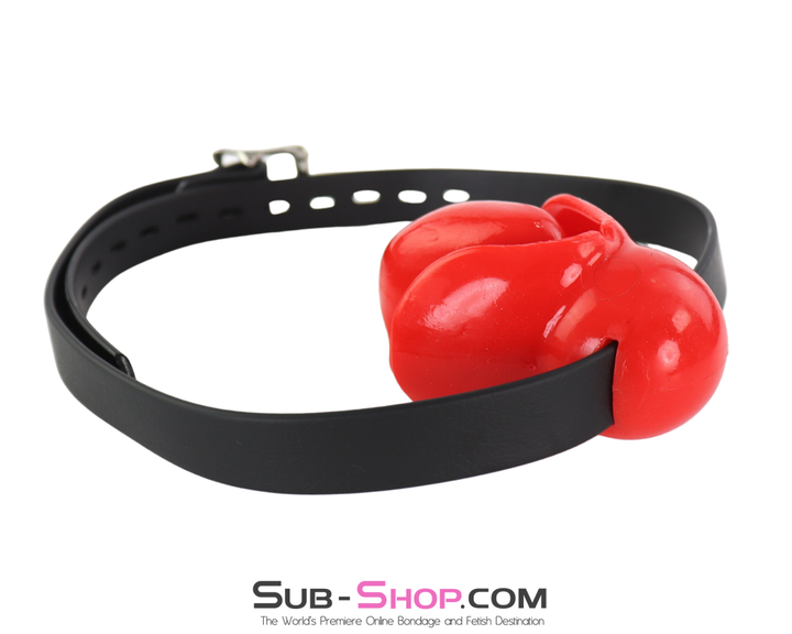 red molded mouth block gag with adjustable strap displayed on white background