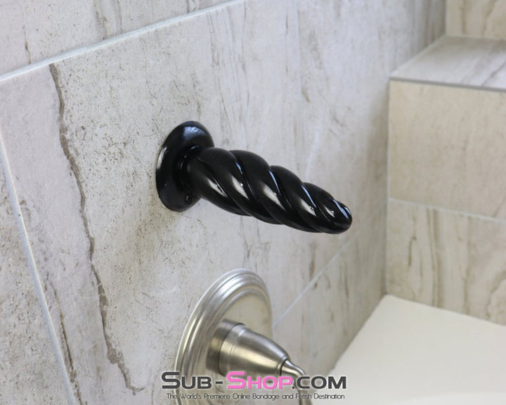 spiral twist anal plug suction cup mounted on shower tile wall