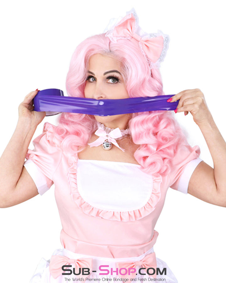 Model holding Purple Bondage Tape strip at her mouth demonstrating quick gag application
